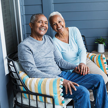 Elderly couple sitting on front porch. Read about What to Give Elderly couple sitting on front porch. Read about What to Give