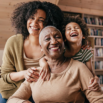 Mother and grandmother laughing with grandchild. Read about Gifts by Will Mother and grandmother laughing with grandchild. Read about Gifts by Will